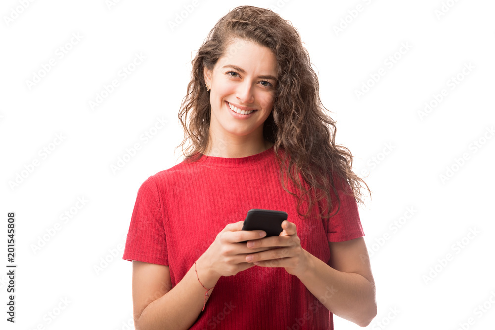 Confident young woman with smart phone Confident young woman with smart phone