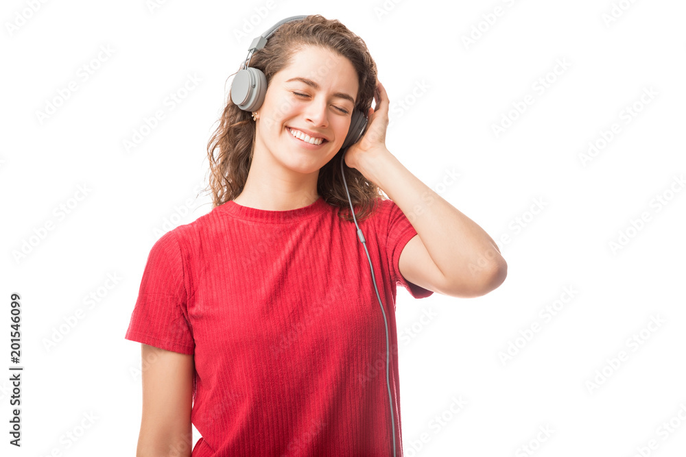 Fototapeta premium Woman listening to her favorite songs