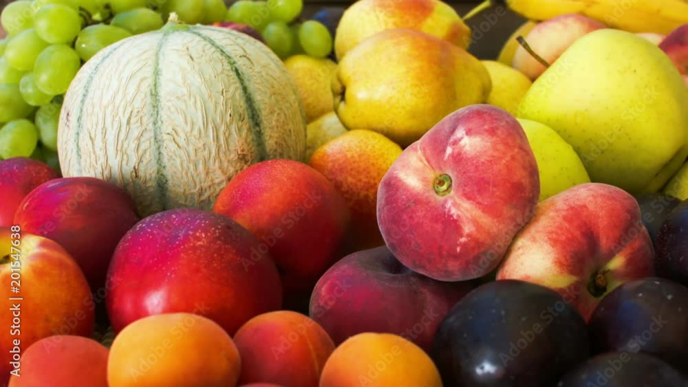 Closeup autumn still-life of fresh fruit on a wooden table Closeup autumn still-life of fresh fruit on a wooden table