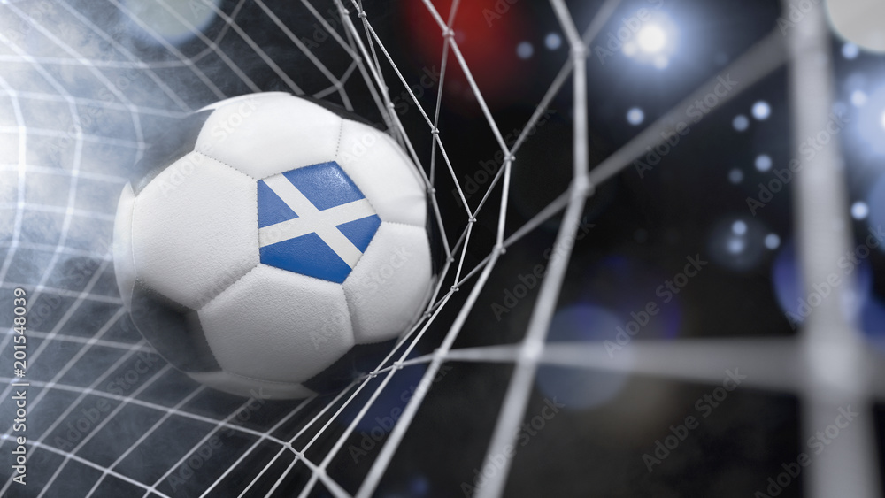 Fototapeta premium Realistic soccer ball in the net with the flag of Scotland.(series)
