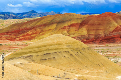 North America, United States, Oregon, Central Oregon, Redmond, Bend, Mitchell. Series of low clay hills striped in colorful bands of minerals, ash and clay deposits. Mounds.