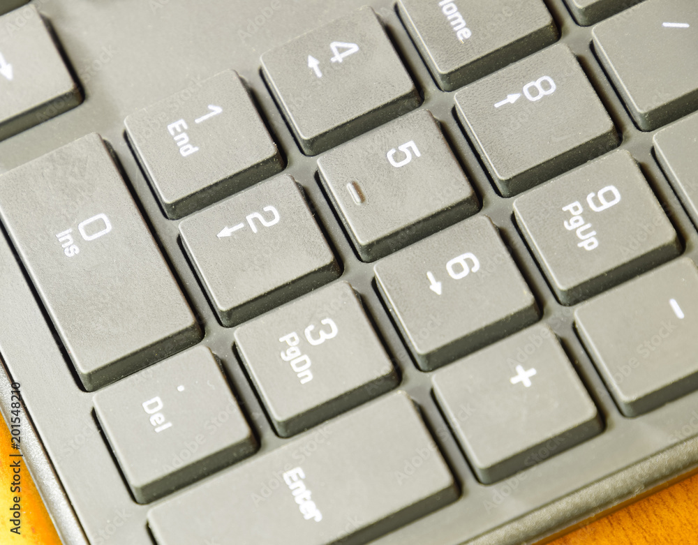 Black slim keyboard computer. A peripheral input device Black slim keyboard computer. A peripheral input device
