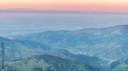 French landscape - Vosges. View from the Grand Ballon in the Vosges  France  towards the Jura and Alps in the early morning.