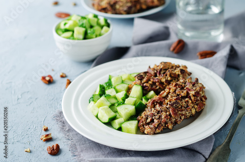 Pecan crust chicken breasts with cucumber s slices