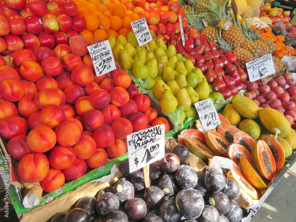 A variety of vegetables for sale at an outdoor produce stand A variety of vegetables for sale at an outdoor produce stand