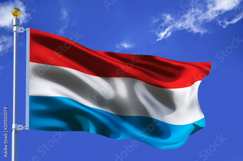 The silk waving flag of Luxembourg with a flagpole on a blue sky background with clouds .3D illustration.