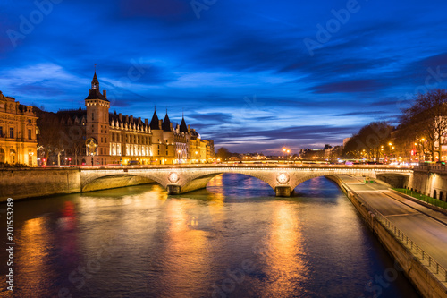 Paris by night, river Seine, illuminated street and building, France © NicoElNino