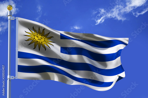 Silk Waving flag with flagpole of Uruguay on background of blue sky with clouds .3d illustration. photo