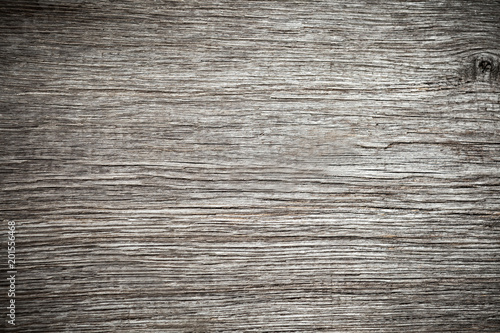Close-up image of textured old wood background with vignetting.