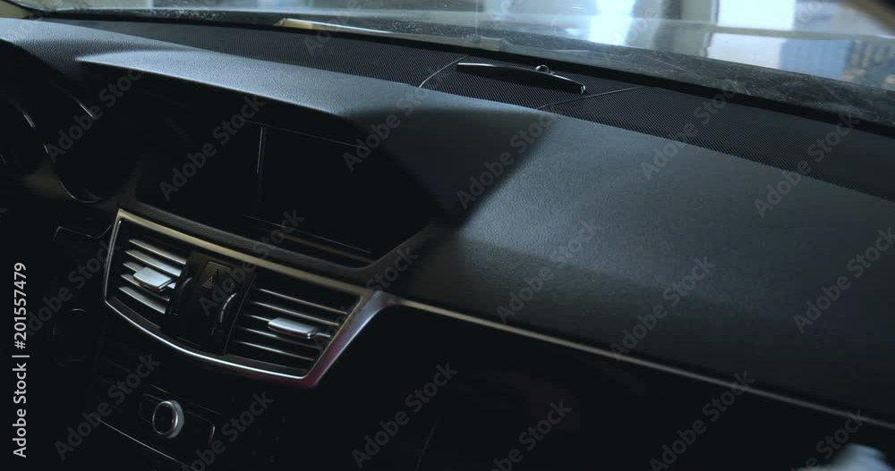 Dry cleaning of the car panel, a rag, pink rubber gloves, car washing. Dry cleaning of the car panel, a rag, pink rubber gloves, car washing.