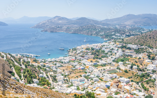 Beautiful sunny village town Panteli harbor view to the greek blue sea water from the old castle with boats cruising surrounded mountains, Medieval Castle, Leros, Dodecanese Islands, Greece  © Thomas Jastram