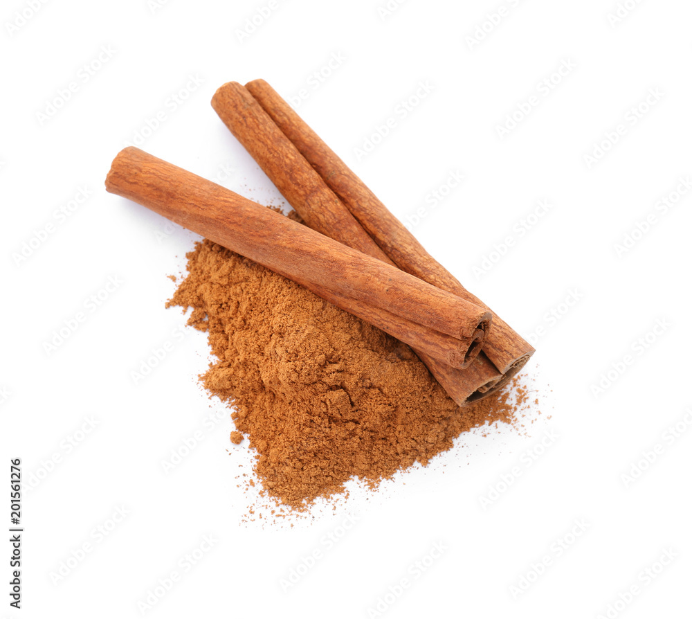 Aromatic cinnamon sticks and powder on white background Aromatic cinnamon sticks and powder on white background