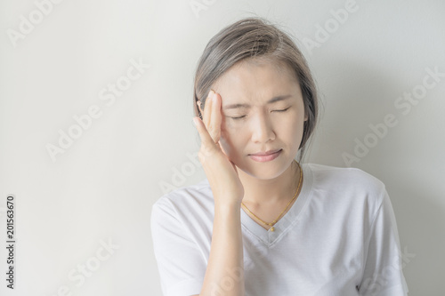 Young woman has headache