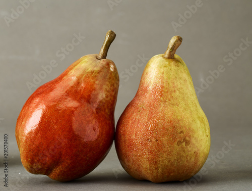 Red Pear on grey background