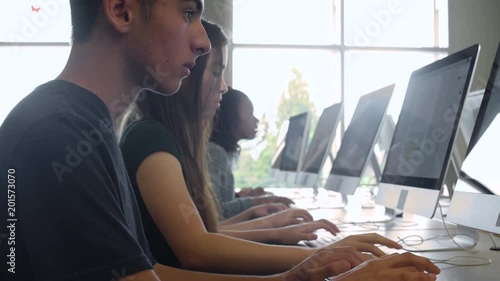 Students studying with computers