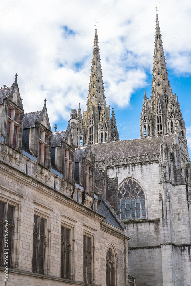 Quimper in Brittany, the Saint-Corentin cathedral, medieval street
