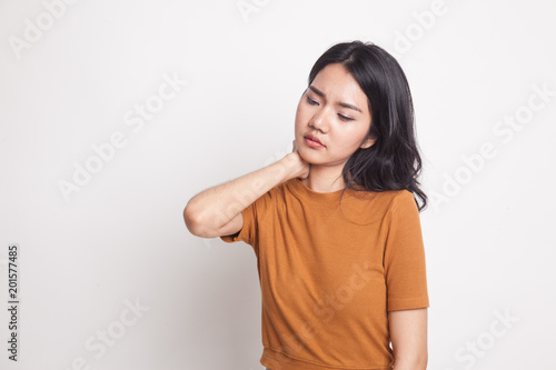 Young Asian woman got neck pain.