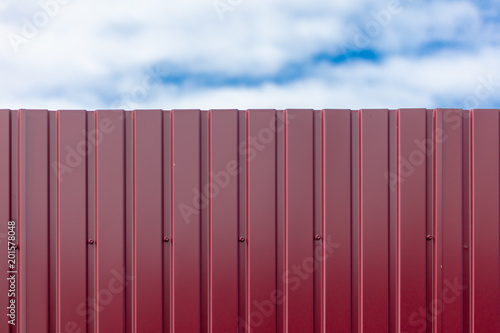 Fence made of metal and blue sky background