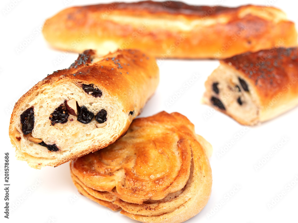 Buns with raisins and jam on a white background Buns with raisins and jam on a white background