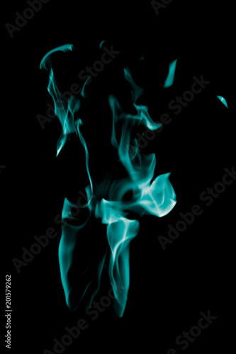 Blue flame of fire on a black background