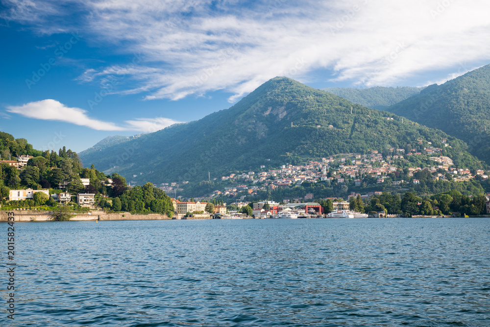 Lake Como, Italy. Tavernola, district of the city of Como, and, on the hill behind, the upper part of Cernobbio, popular tourist destinations on Lake Como