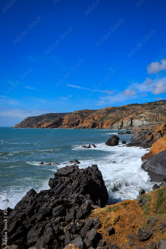 Portuguese coastline with the ocean and the sintra mountains in background. Cascais Portugal Portuguese coastline with the ocean and the sintra mountains in background. Cascais Portugal