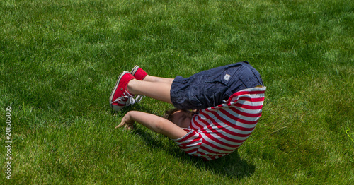 Somersault in the grass