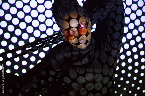Slika na platnu Creative dotted pattern from projection light on beautiful women with dark skin