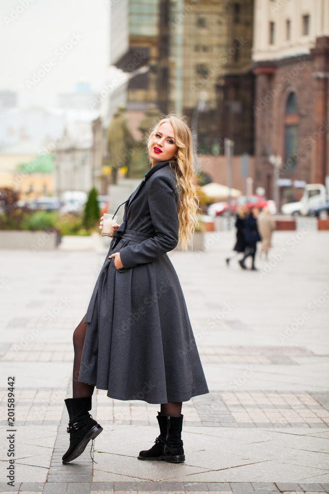 Portrait of a young beautiful woman in gray coat Portrait of a young beautiful woman in gray coat