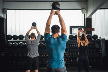 Fotobehang Fitness Groepsles workout in sportschool  © Lydia Goolia