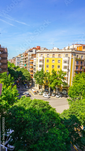 View from above of a colouful tree-lined street in Barcelona, Spain