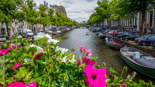 Photography View down a canal in Amsterdam, Netherlands