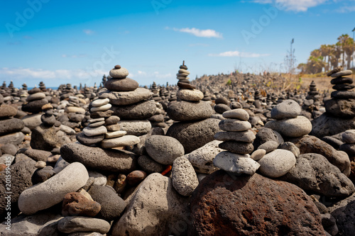 Stack of stones on the sea beach. Tenerife island.