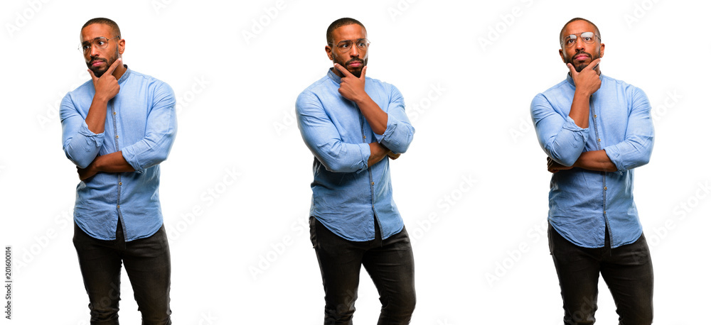African american man with beard doubt expression, confuse and wonder concept, uncertain future African american man with beard doubt expression, confuse and wonder concept, uncertain future