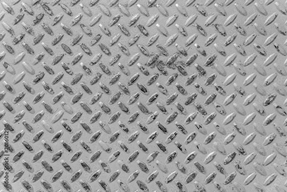Metallic background. A steel plate with spikes as an abstract background. Metallic background. A steel plate with spikes as an abstract background.