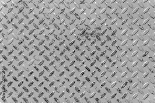 Metallic background. A steel plate with spikes as an abstract background.