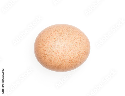 One brown chicken egg top view isolated on white background domestic.