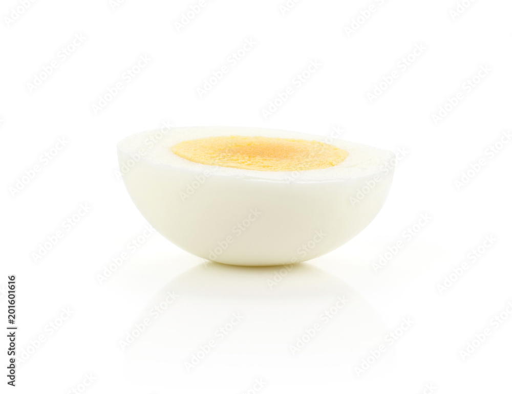 One boiled chicken egg half isolated on white background. One boiled chicken egg half isolated on white background.