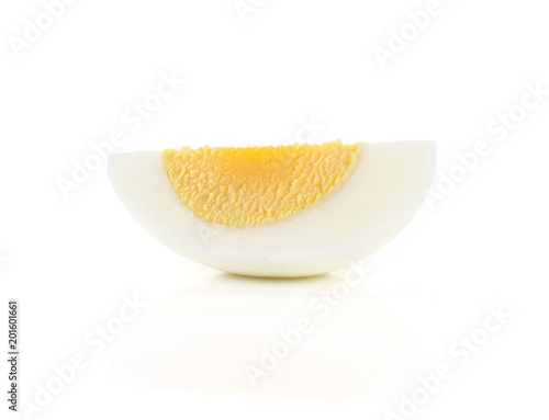One boiled chicken egg slice isolated on white background.