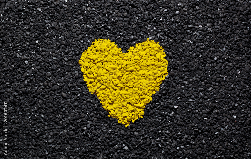 Yellow heart on the black background, stones, gravel and shingle, love  wallpaper, valentine Stock Photo | Adobe Stock