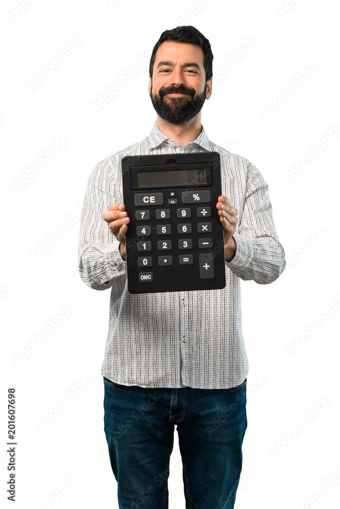 Handsome man with beard holding a calculator Handsome man with beard holding a calculator