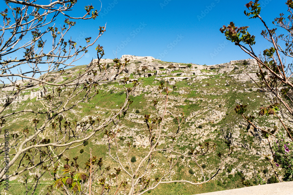 Horizontal View of the Sassi of Matera on Blue Sky Background. Matera, South of Italy Horizontal View of the Sassi of Matera on Blue Sky Background. Matera, South of Italy