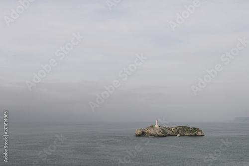 Panoramic view of Mouro Island and lighthouse in Santander, Spain