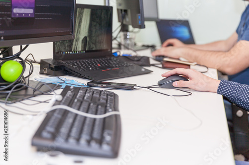 Software developer, coder or programmer working on computer