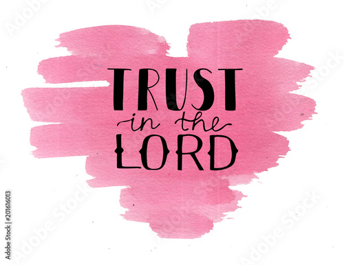 Hand lettering Trust in the Lord on watercolor heart.