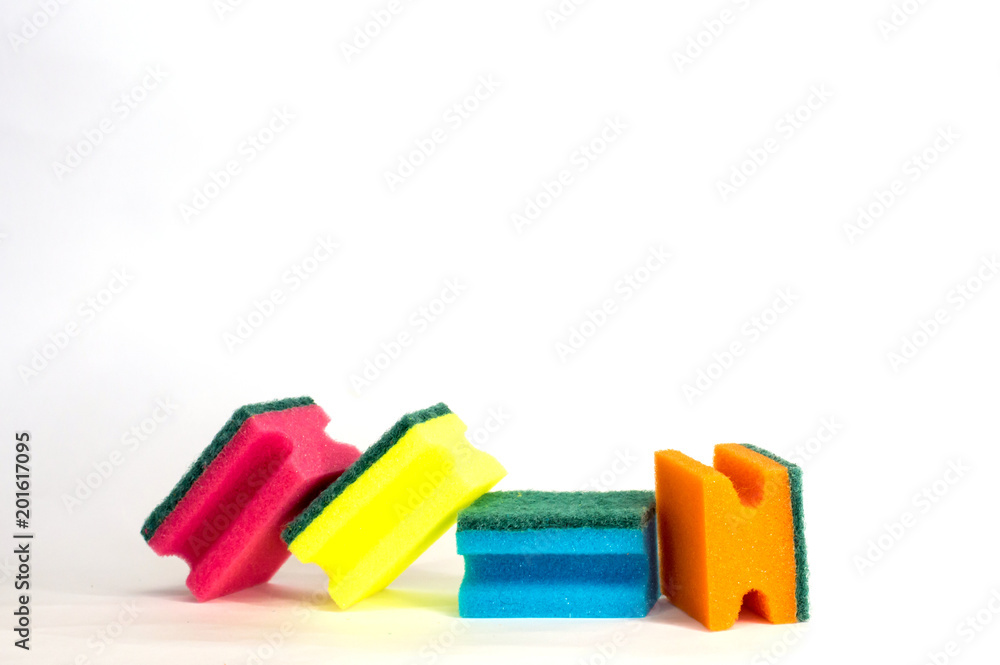 multicolored dish washing sponge on white background in different positions multicolored dish washing sponge on white background in different positions