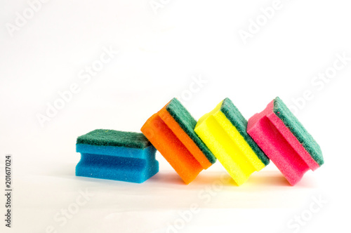 multicolored dish washing sponge on white background in different positions