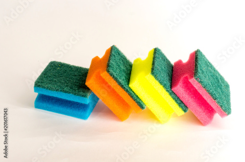 multicolored dish washing sponge on white background in different positions