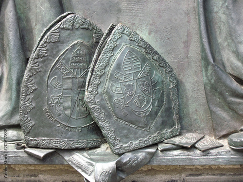 Relief in honor of the meeting of Pope Ioannes Paulus PP. II and Cardinal Joseph Alois Ratzinger in Cologne. It is installed on the outer wall of the Cologne Cathedral. Germany, Cologne, August 2013 photo