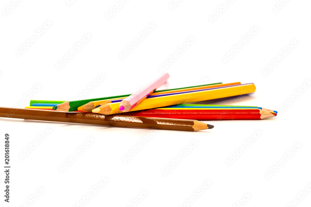 colored pencils lying on white background colored pencils lying on white background